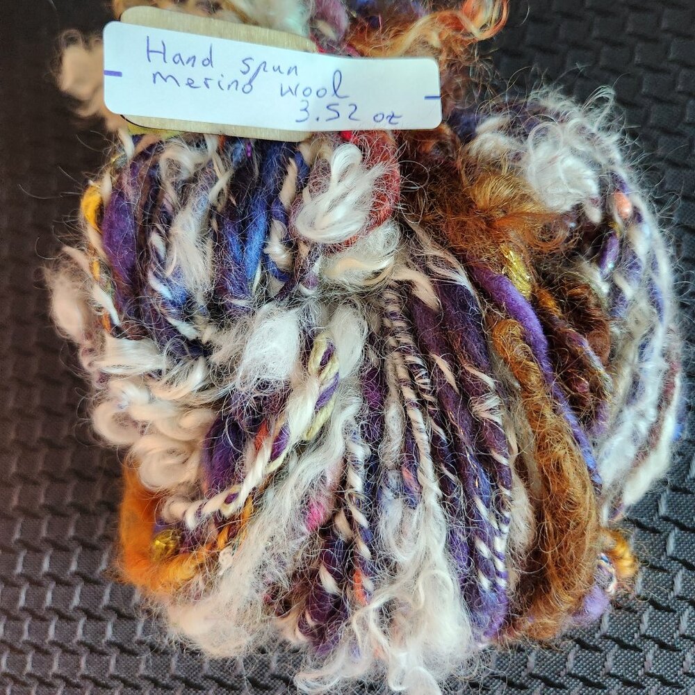 Yarn, art yarn, handspun, new, colorful with wool locks. 2.5oz.